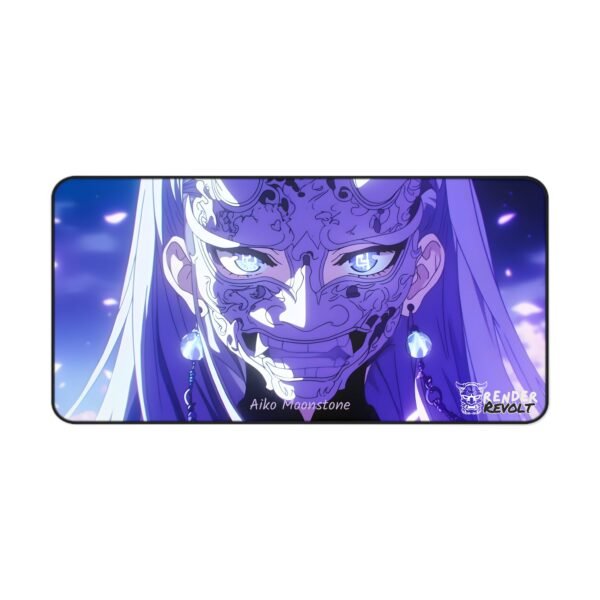 A close-up view of an anime mouse pad design featuring "Aiko Moonstone." The character has one half of their face covered by a white oni mask, while the other half reveals a calm expression with glowing purple eyes. The pad rests on a white desk with a monitor, gaming PC, and accessories.
