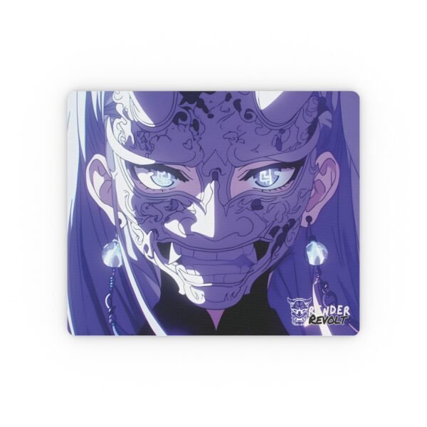 Anime mouse pad featuring a bold mask with glowing eyes, placed on a clean workspace with a laptop, plant, and other accessories.