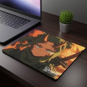 Aya Earth Oni Mouse Pad featuring a battle-ready green-haired warrior with horns, tactical gear, and a sword, set against a blazing sunset on a dark wooden desk next to a laptop and plant.