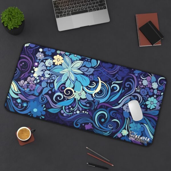 A full overhead view of the desk pad with an intricate swirling floral design in deep purple, blue, and teal hues.