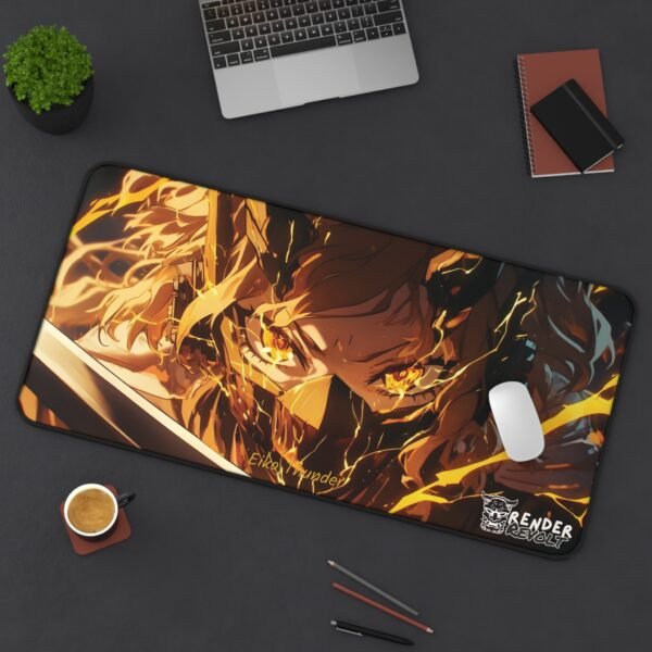 Close-up detail of an anime gaming desk mat with an intense orange and black design and stitched edges.