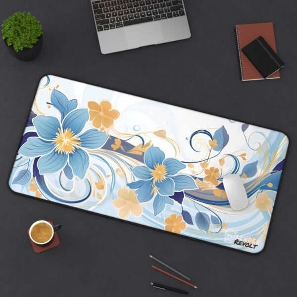 A soft, elegant desk mat with flowing white and gold floral designs, set against a subtle blue gradient background. The "Render Revolt" logo is at the bottom right corner.