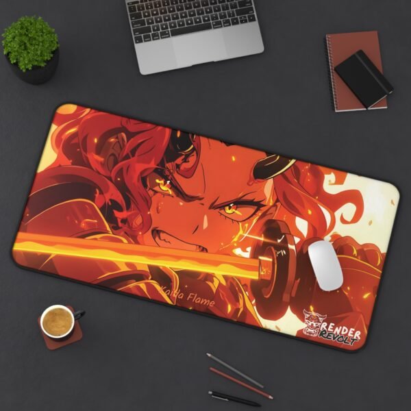 The Kaida Flame desk mat placed on a dark workspace with a laptop, coffee, and accessories, emphasizing its glowing fire aesthetics.
