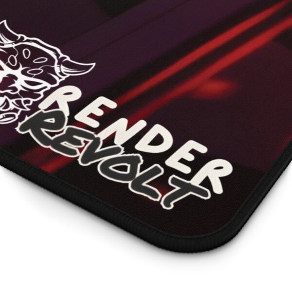A zoomed-in shot of the Render Revolt logo on the corner of a dark-themed desk mat, showing the precision stitching and material texture.