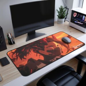 A Kira Obsidian Desk Mat laid on a modern wooden desk, displaying a side-profile view of a warrior with black hair, molten red cracks, and red horns against an intense orange sky.