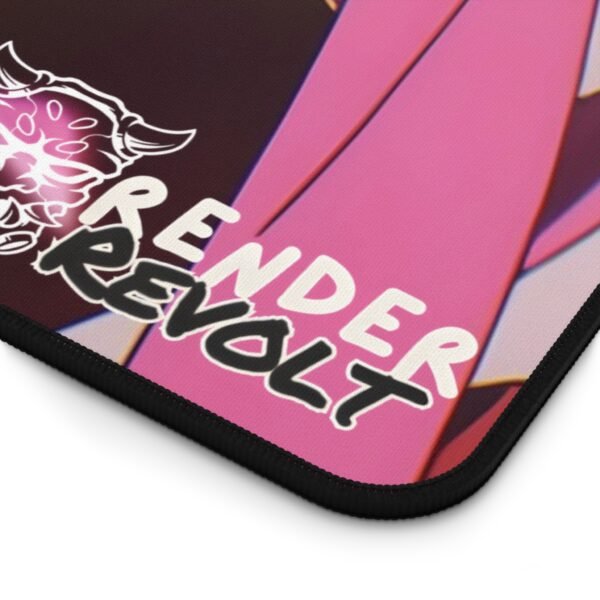 A detailed corner shot highlighting the Render Revolt branding on the fabric surface of the green desk pad with precise stitched edges.
