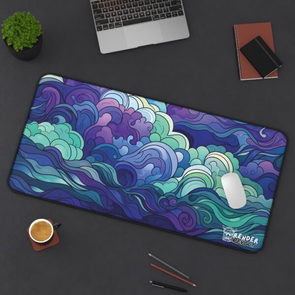 A desk mat with an ocean wave-inspired pattern in shades of blue, purple, and teal, placed under a mouse on a dark desk.