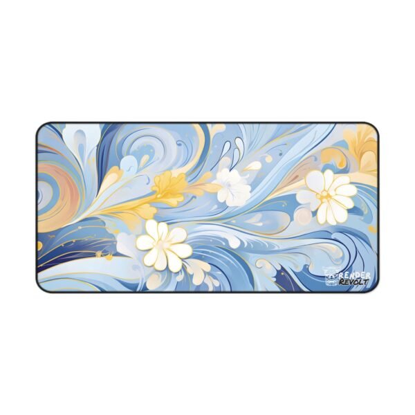 Close-up shot of a desk mat corner with a gold and blue floral swirl design, showcasing the "Render Revolt" logo in white and black with a stylized tiger emblem.