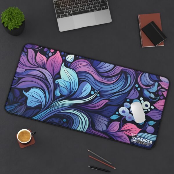 The same deep blue and purple desk mat placed on a dark workspace, accompanied by a laptop, coffee cup, and writing utensils, creating a sophisticated and creative setup.