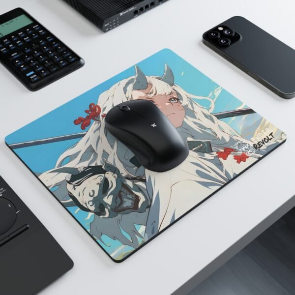 A mouse pad with an illustrated warrior donning small horns, a white robe, and a sword across their back, placed on a dark wooden desk beside a laptop and a potted plant.