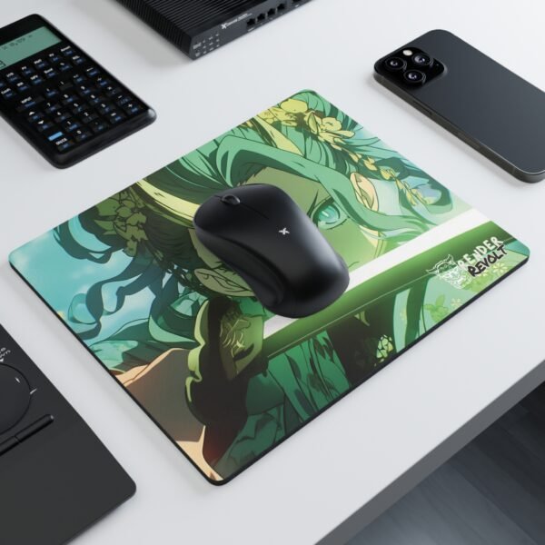 A modern workspace with a black wireless mouse resting on a vibrant anime-style mouse pad, which features a fierce character with glowing blue eyes, golden horns, and a green energy sword.