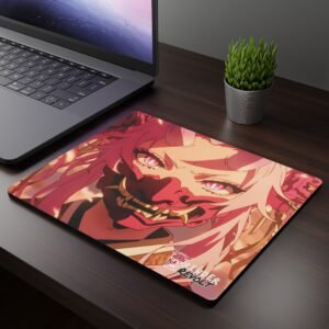 Suki Hannya Mouse Pad - A dark wooden desk setup featuring a laptop and an anime-themed mouse pad, showcasing a fierce character with flowing pink hair, glowing pink eyes, and a red demon mask covering their lower face.