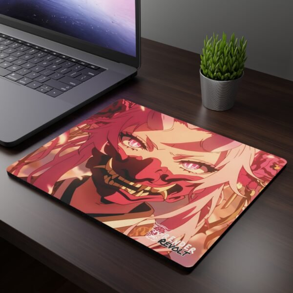 Suki Hannya Mouse Pad - A dark wooden desk setup featuring a laptop and an anime-themed mouse pad, showcasing a fierce character with flowing pink hair, glowing pink eyes, and a red demon mask covering their lower face.